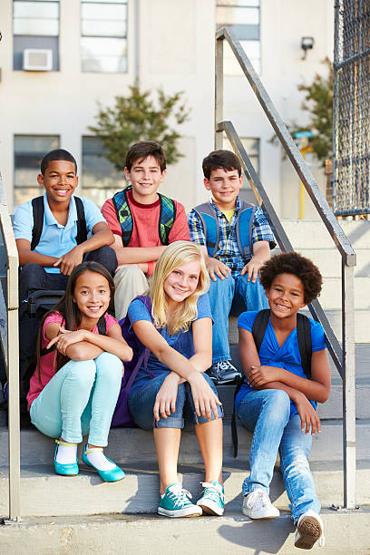 students sitting on stairs
